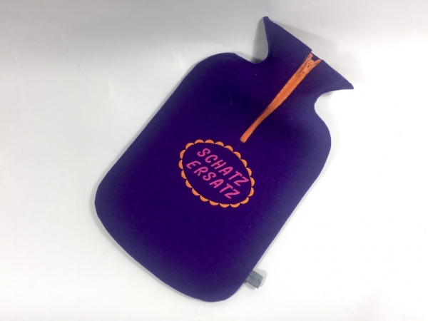Filz-Wärmflasche in lila mit Schatzersatz